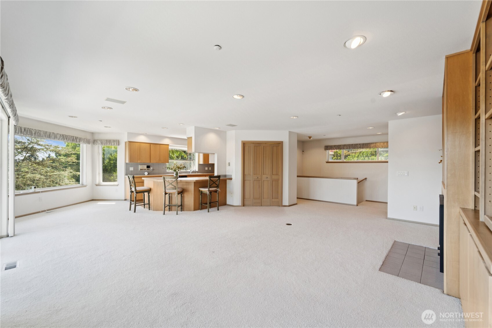 19749 53rd Avenue Northeast Lake Forest Park, WA 98155 - Photo 4 of 35 a view of a livingroom with furniture and a garage