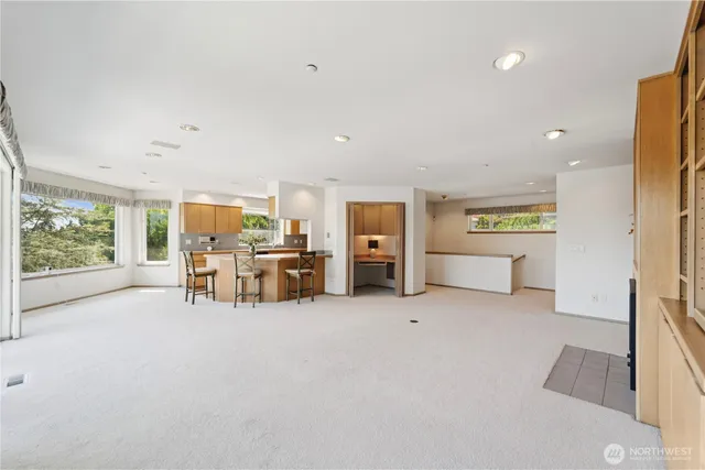 a view of a big room with furniture and a livingroom