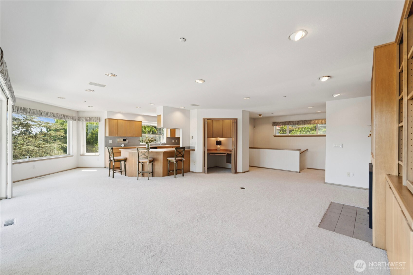 19749 53rd Avenue Northeast Lake Forest Park, WA 98155 - Photo 5 of 35 a view of a big room with furniture and a livingroom