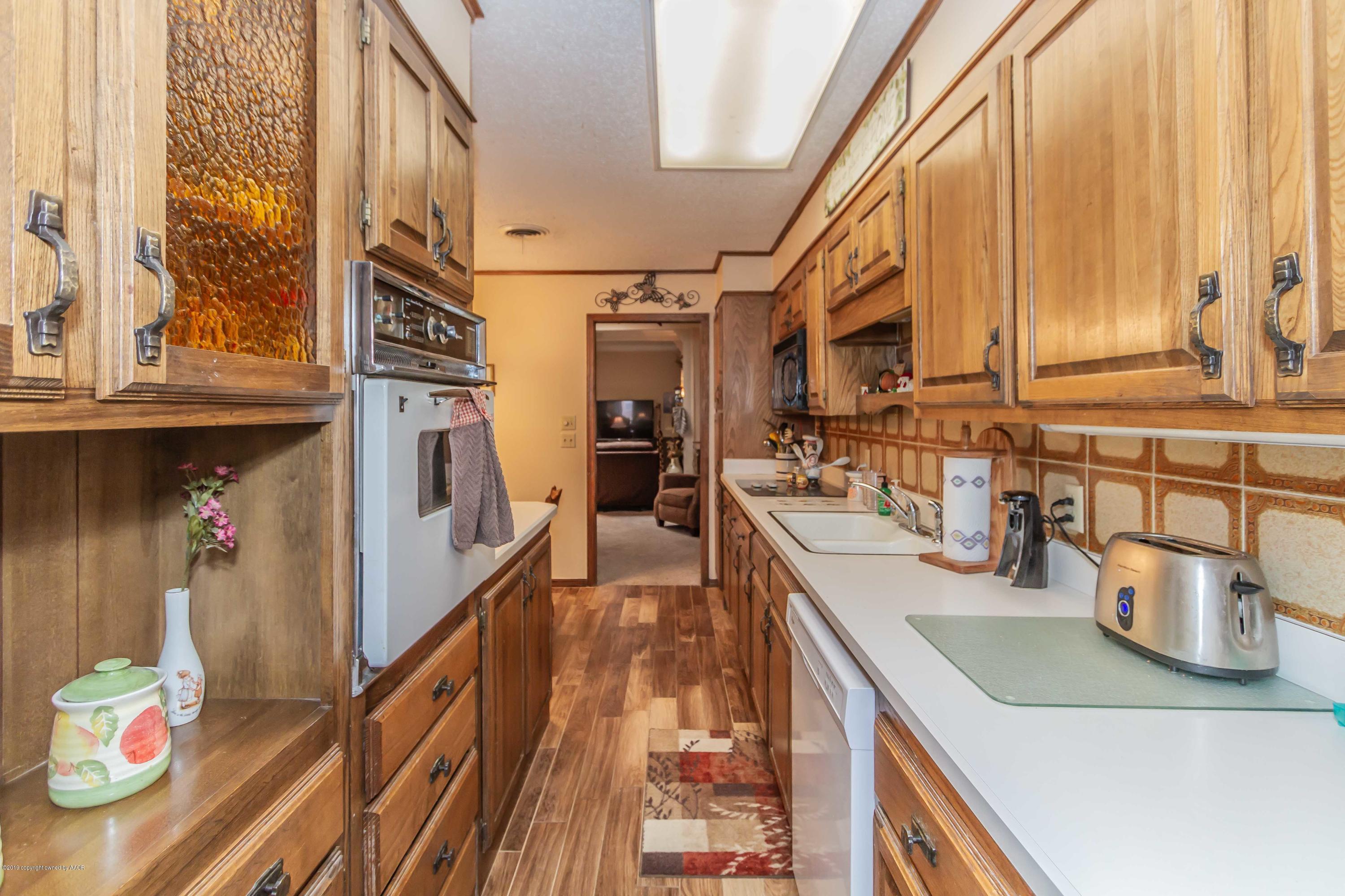 6132 Belpree Road Amarillo, TX 79106 - Photo 11 of 38 KITCHEN VIEW 3