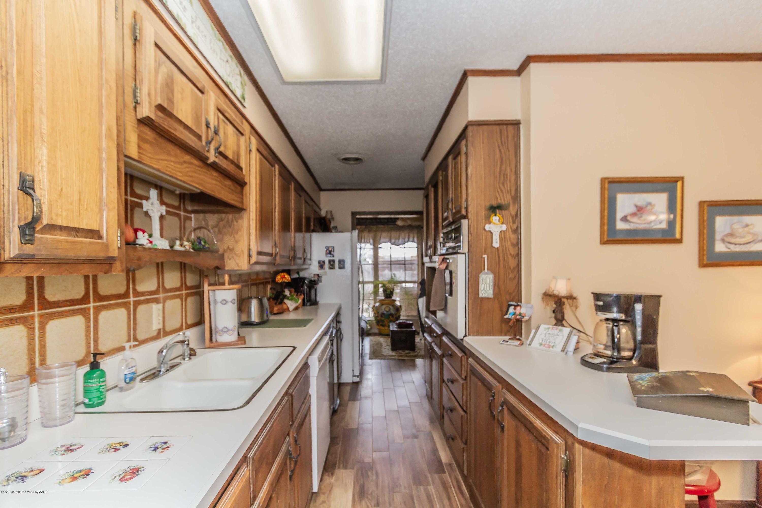 6132 Belpree Road Amarillo, TX 79106 - Photo 9 of 38 KITCHEN VIEW 1