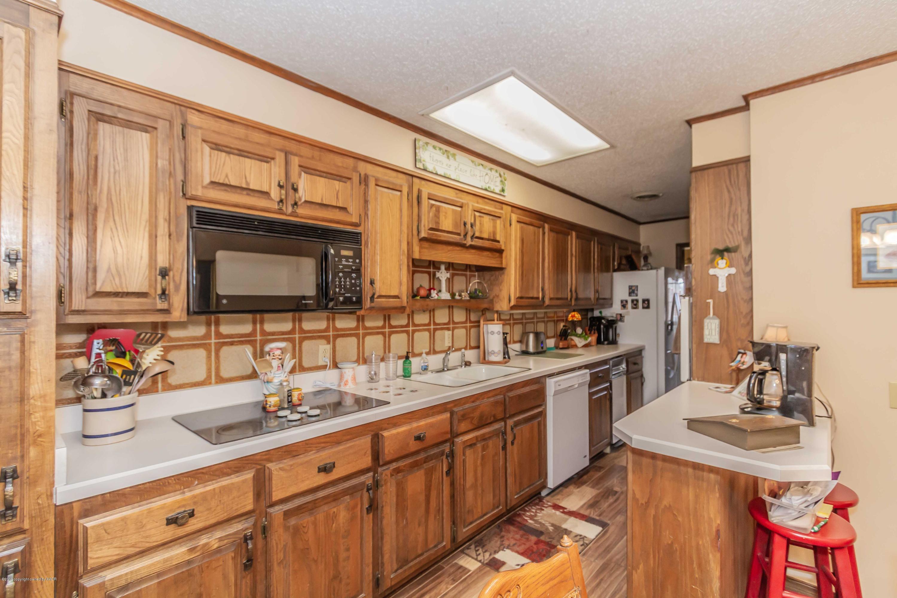 6132 Belpree Road Amarillo, TX 79106 - Photo 10 of 38 KITCHEN VIEW 2