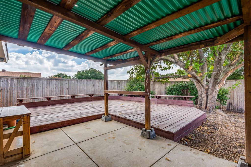 1930 Rambling Ridge Lane Carrollton, TX 75007 - Photo 13 of 15 Covered Patio, Fenced In Backyard, Deck
