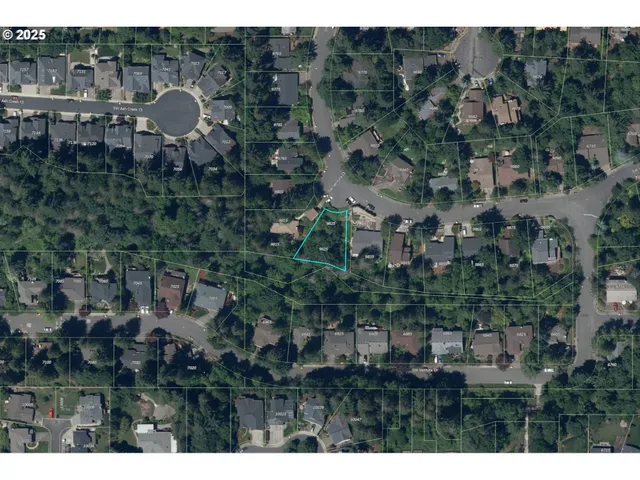 a view of a house in a field