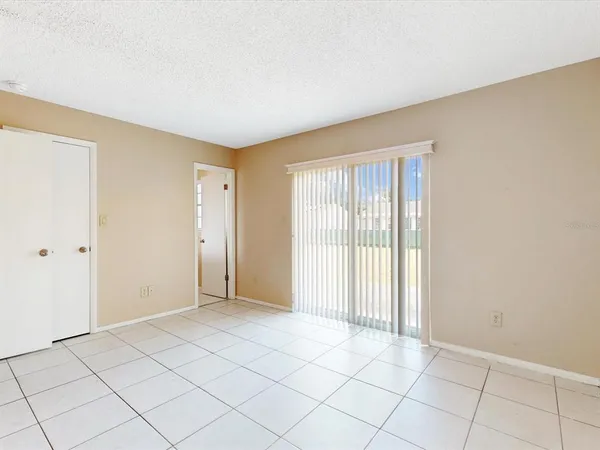 a view of an empty room and window