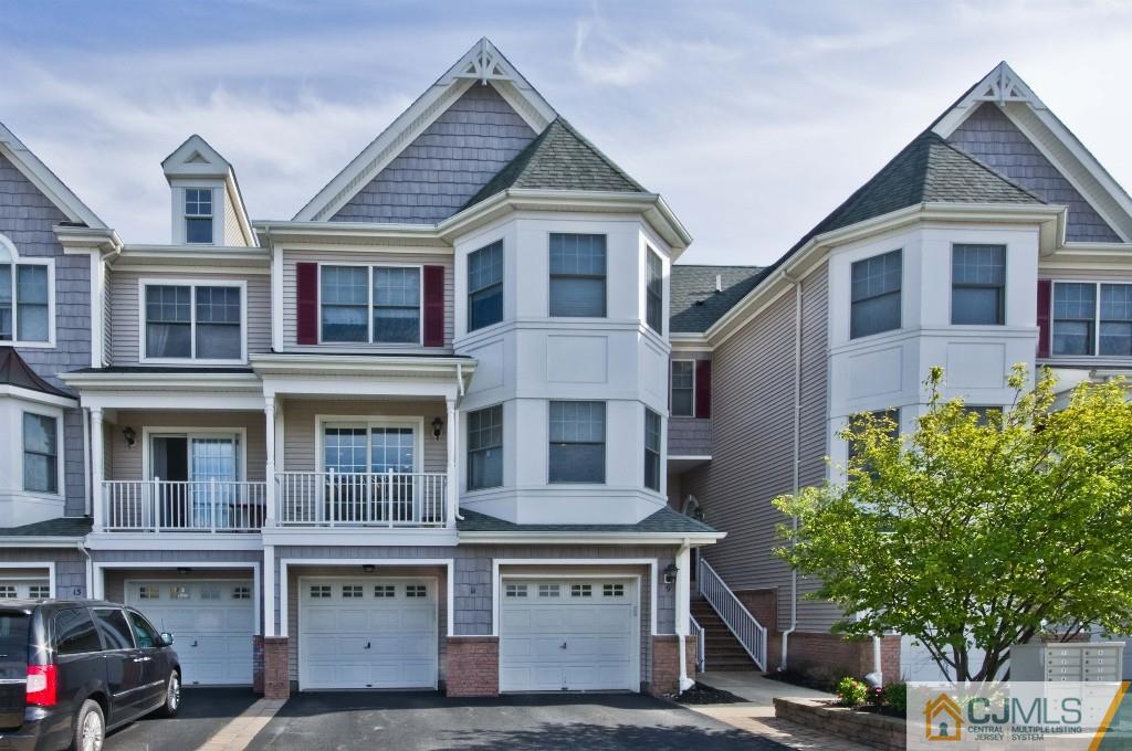 11 Raritan Reach Road South Amboy, NJ 08879 - Photo 1 of 20 a front view of a house with a yard