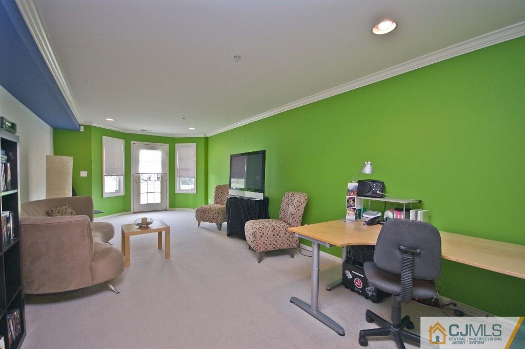 11 Raritan Reach Road South Amboy, NJ 08879 - Photo 14 of 20 a workspace with furniture hardwood and a window