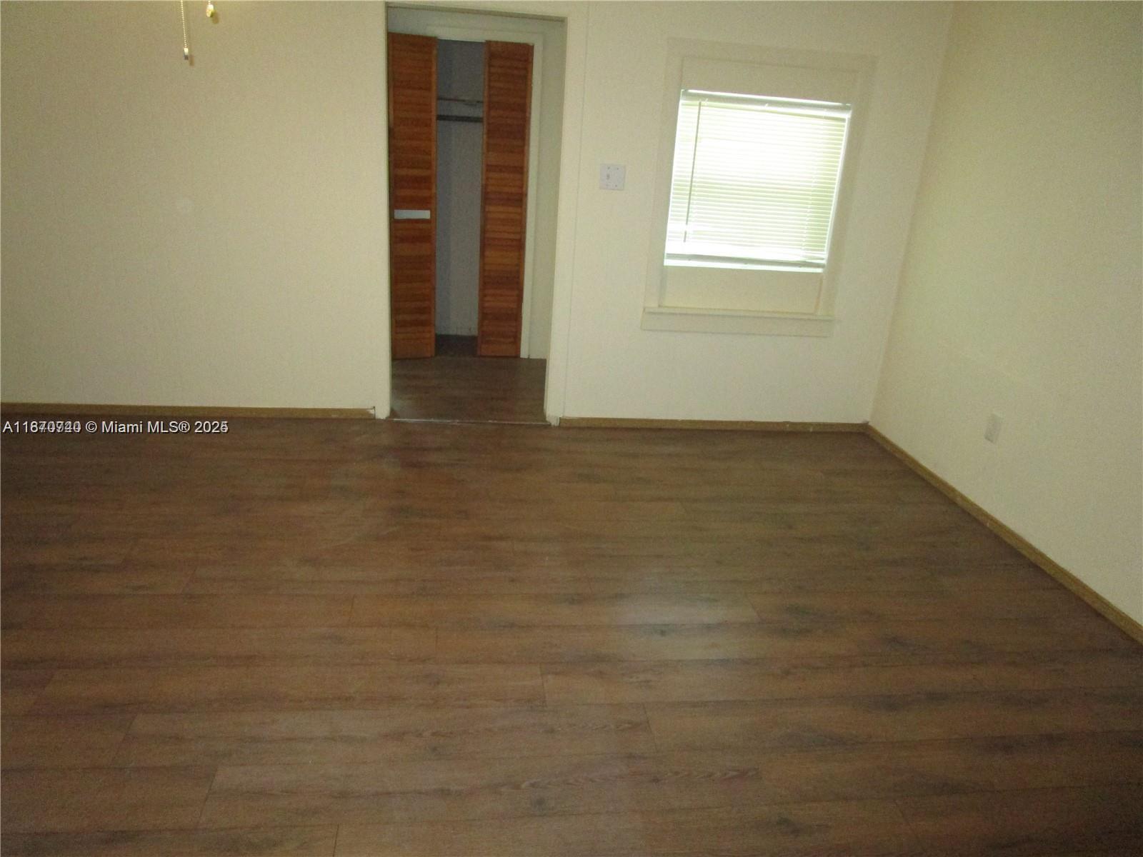 349 Cypress Avenue Pahokee, FL 33476 - Photo 7 of 15 a view of an empty room