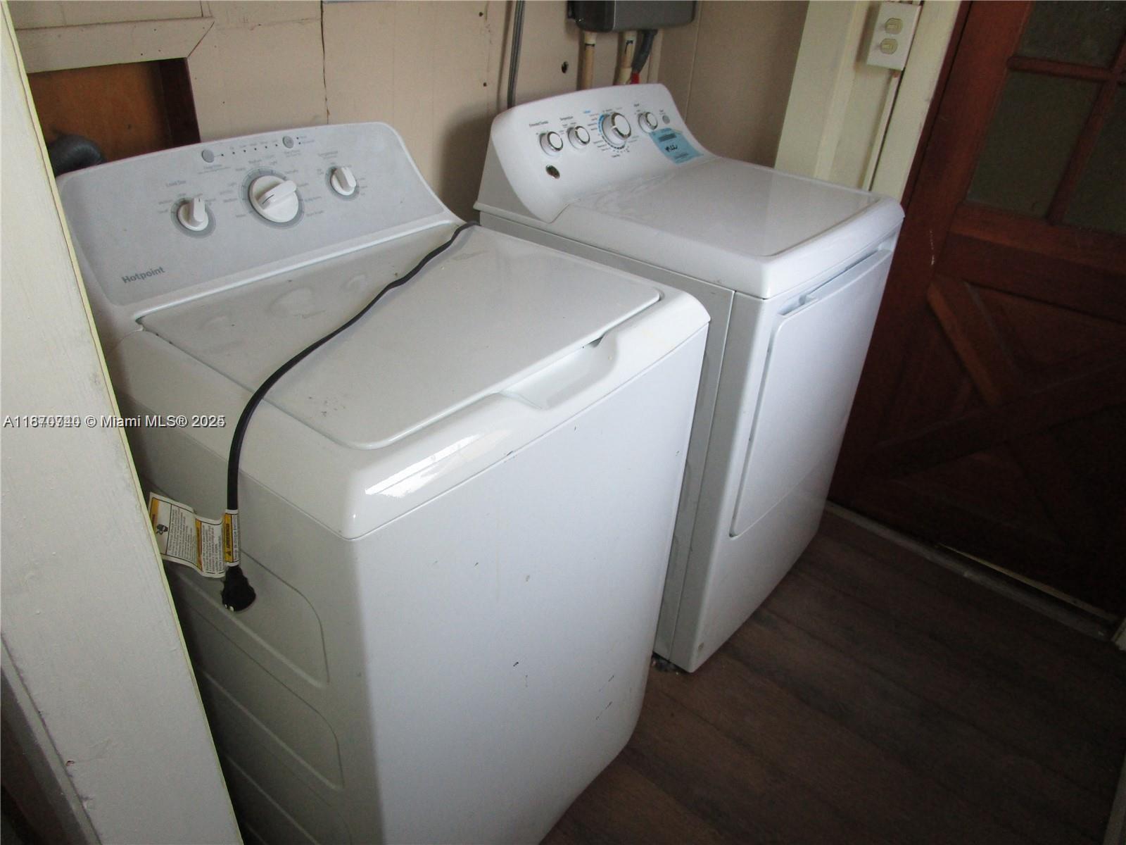 349 Cypress Avenue Pahokee, FL 33476 - Photo 10 of 15 a utility room with dryer and washer