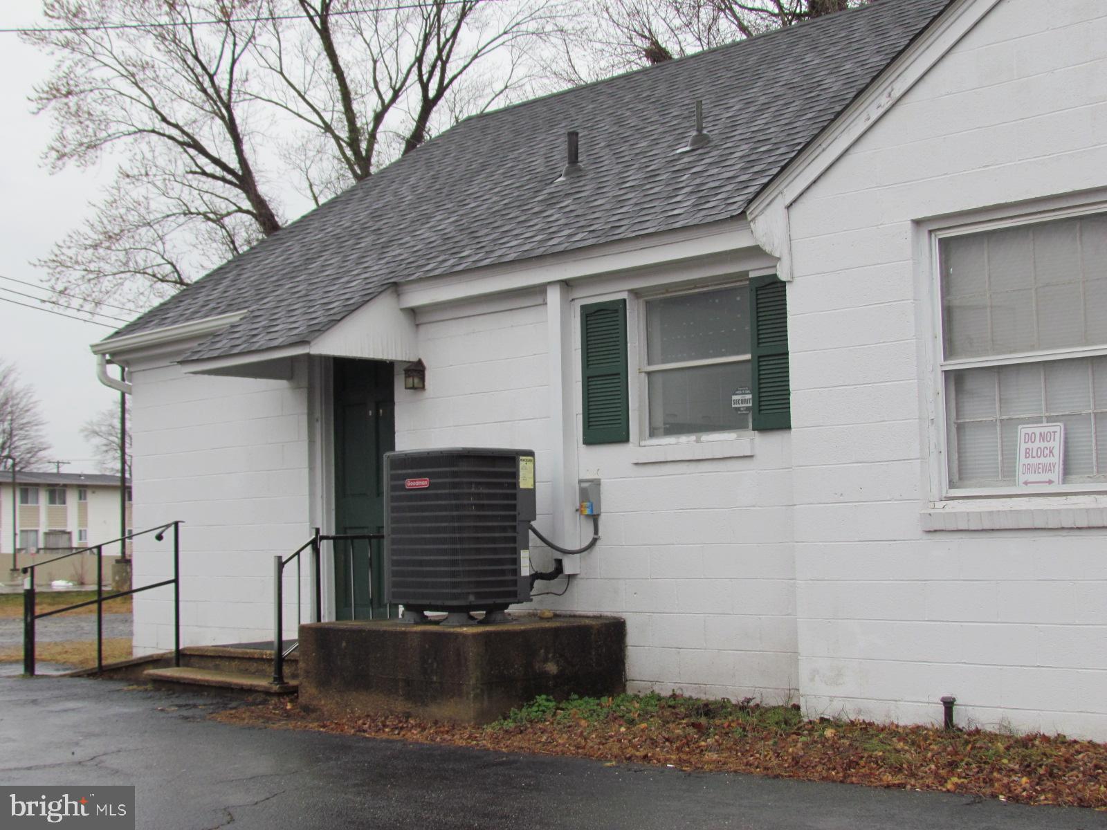 25365 Point Lookout Road Leonardtown, MD 20650 - Photo 3 of 5 a front view of a house with stairs