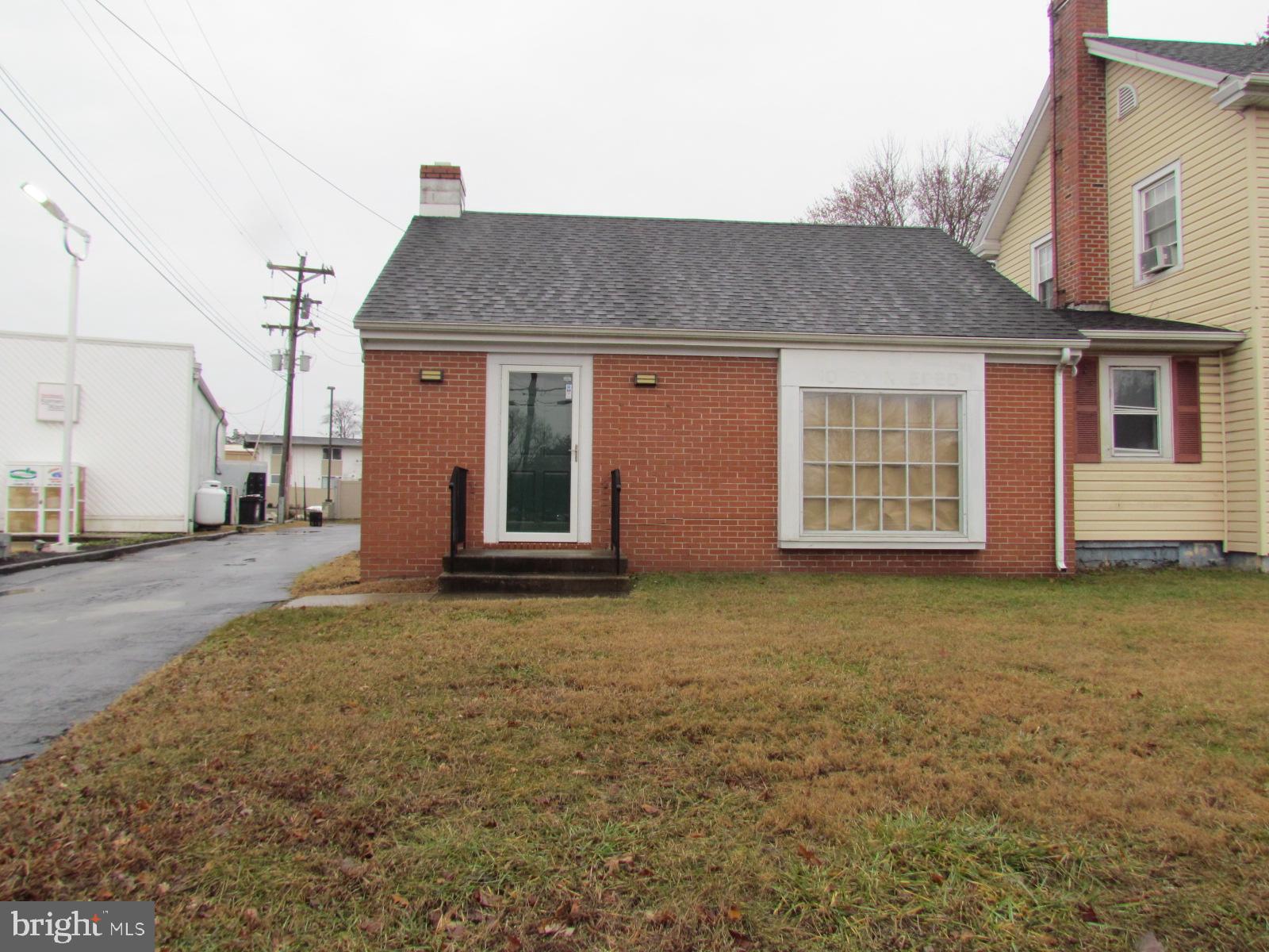 25365 Point Lookout Road Leonardtown, MD 20650 - Photo 5 of 5 a house that has a window in front of it