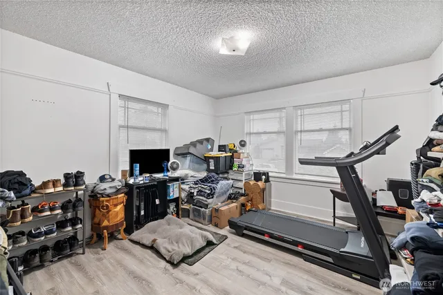 a view of a workspace with furniture and a workspace