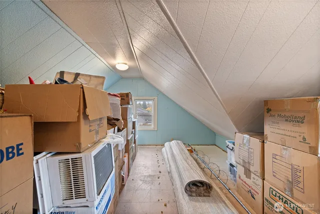 a bathroom with a sink a mirror and vanity