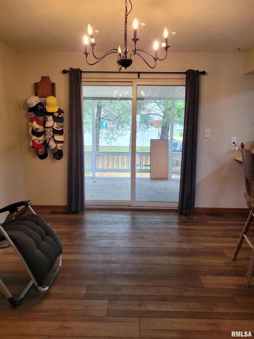 469 Main Street Radom, IL 62808 - Photo 11 of 23 a view of a livingroom with wooden floor