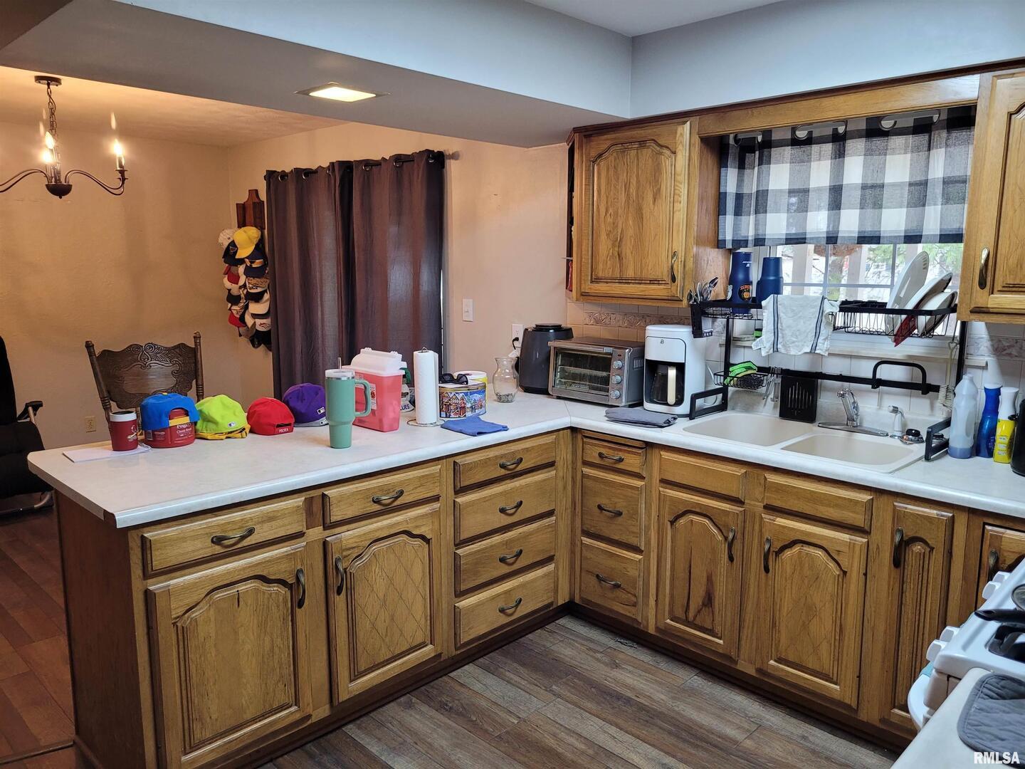 469 Main Street Radom, IL 62808 - Photo 8 of 23 a kitchen with a sink cabinets and window