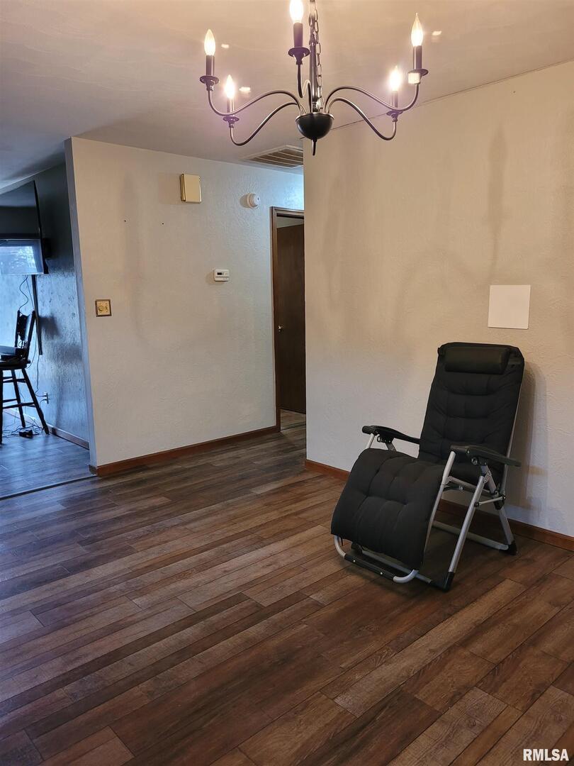 469 Main Street Radom, IL 62808 - Photo 10 of 23 a view of workspace with wooden floor and windows
