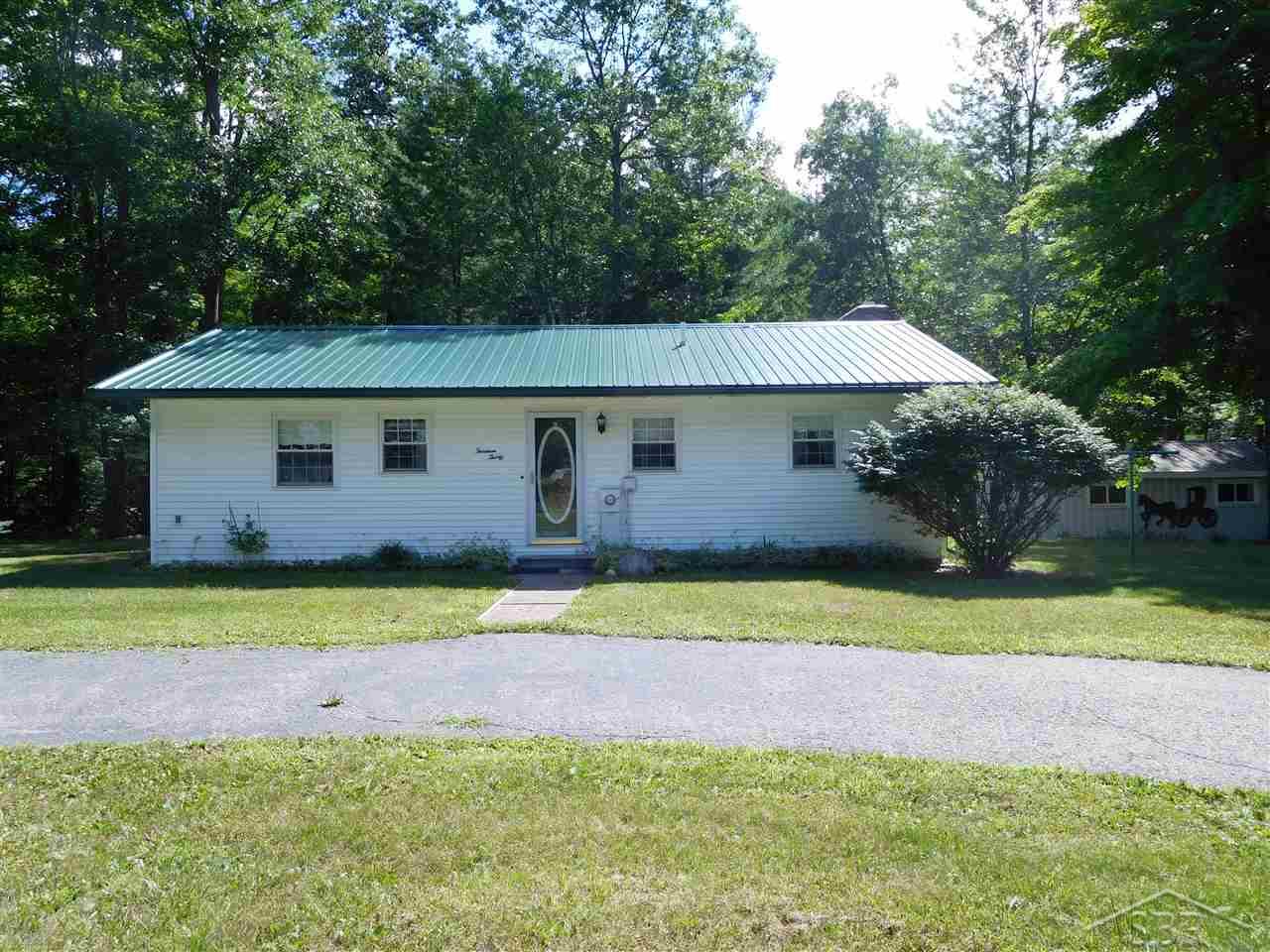 1330 Stoney Ridge Road West Branch, MI 48661 - Photo 2 of 20 Metal roof