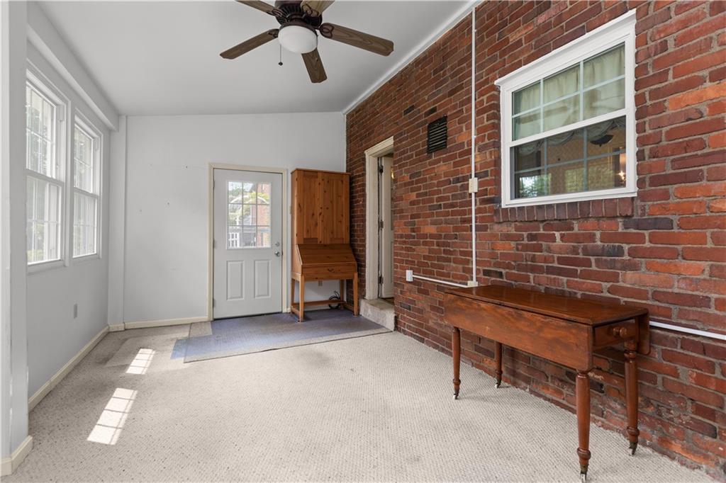 442 Serrano Avenue Pittsburgh, PA 15228 - Photo 15 of 31 a view of a livingroom with furniture and windows