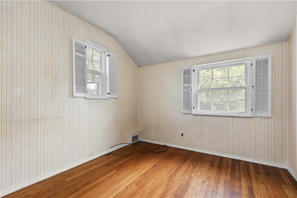 442 Serrano Avenue Pittsburgh, PA 15228 - Photo 20 of 31 an empty room with wooden floor and windows