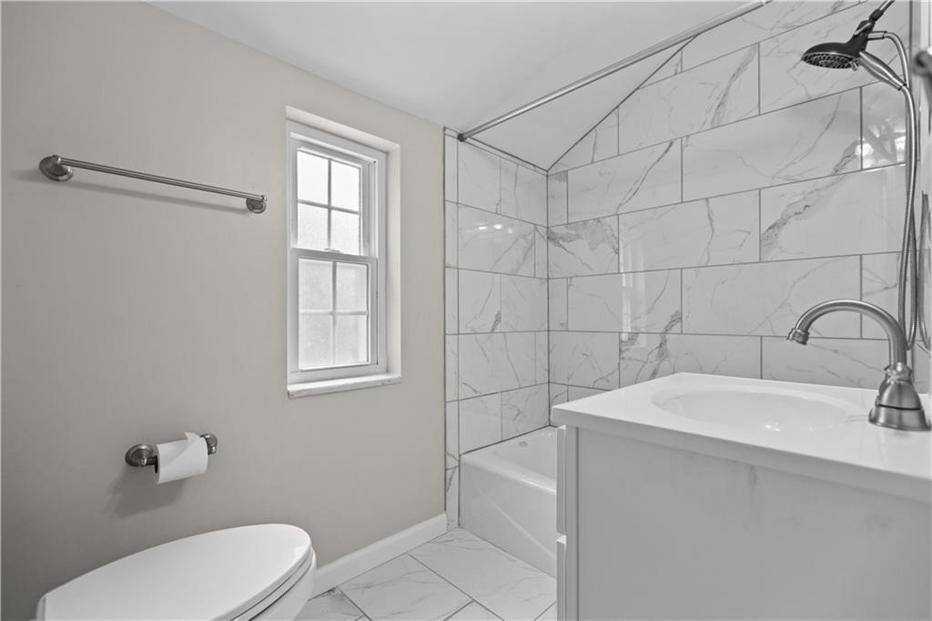 442 Serrano Avenue Pittsburgh, PA 15228 - Photo 22 of 31 a bathroom with a sink toilet and shower