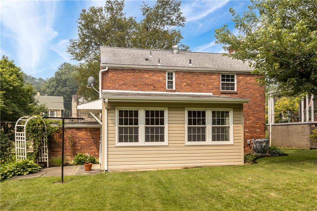 442 Serrano Avenue Pittsburgh, PA 15228 - Photo 24 of 31 a view of a house with a yard