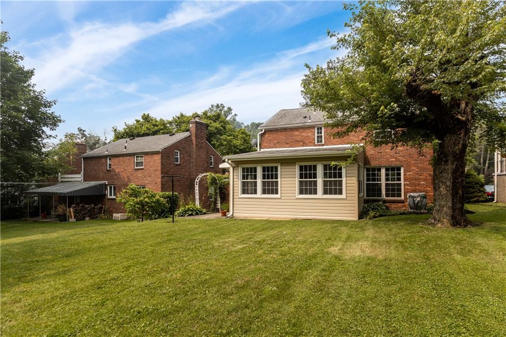 442 Serrano Avenue Pittsburgh, PA 15228 - Photo 25 of 31 a front view of house with yard and green space