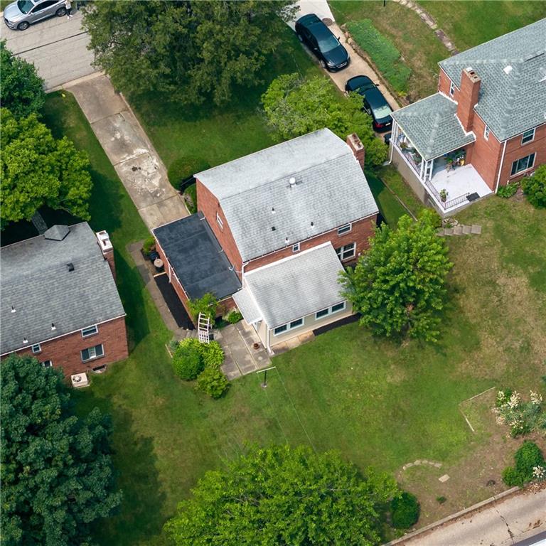 442 Serrano Avenue Pittsburgh, PA 15228 - Photo 26 of 31 an aerial view of a house with a garden and mountain view