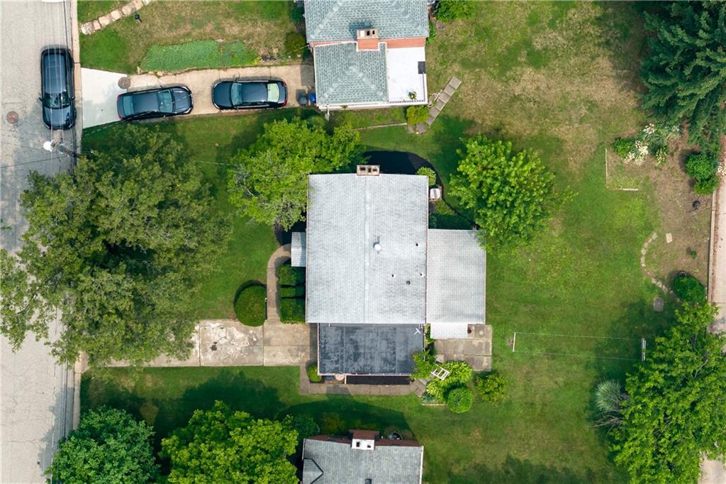442 Serrano Avenue Pittsburgh, PA 15228 - Photo 27 of 31 an aerial view of a house with a yard and a large tree