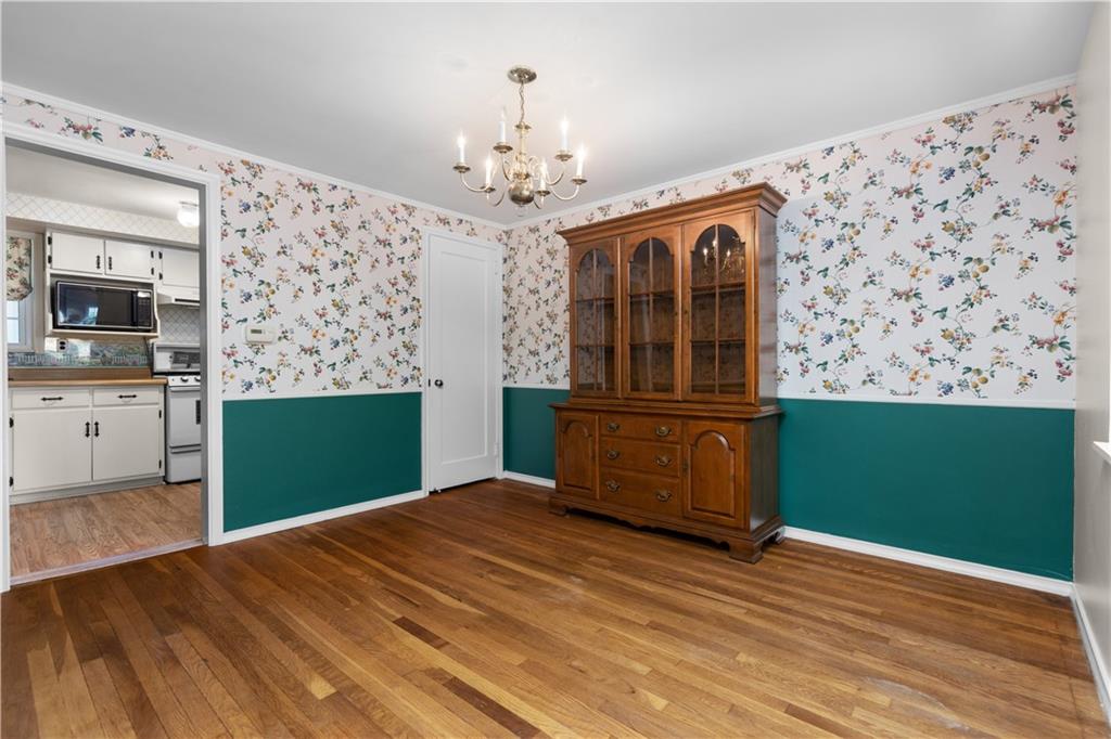 442 Serrano Avenue Pittsburgh, PA 15228 - Photo 6 of 31 a bedroom with a bed and a dresser