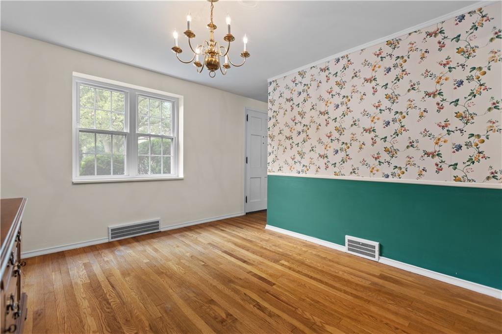 442 Serrano Avenue Pittsburgh, PA 15228 - Photo 8 of 31 a view of a room with wooden floor and a window