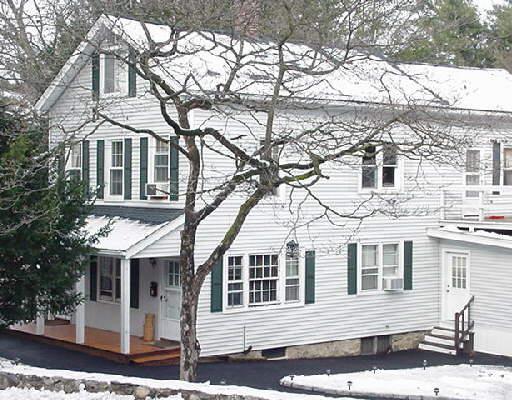 74 Devils Garden Road Norwalk, CT 06854 - Photo 1 of 1 a front view of a house with a yard