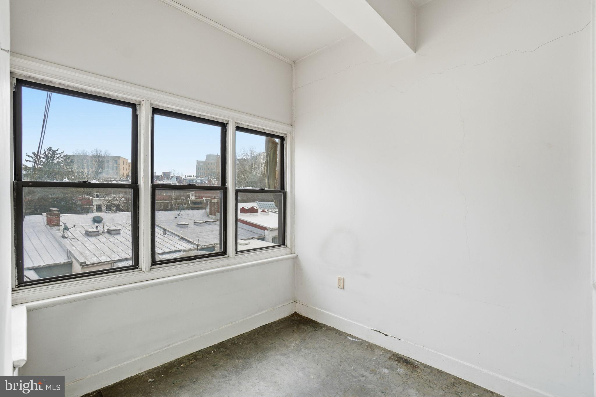 2040 Belmont Road Northwest, Unit 536 Washington, DC 20009 - Photo 15 of 31 Bright, airy space with urban views.