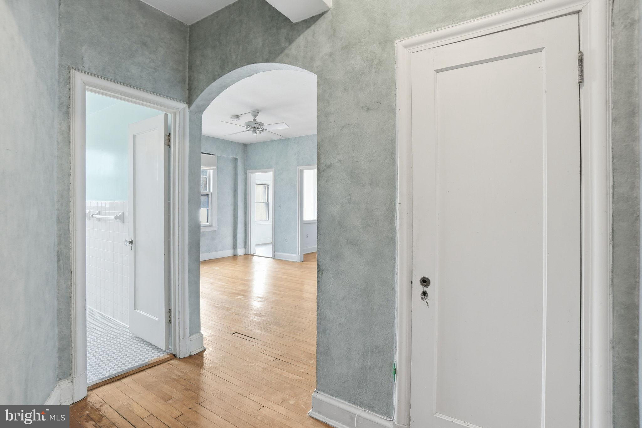 2040 Belmont Road Northwest, Unit 536 Washington, DC 20009 - Photo 3 of 25 Inviting entryway with charming archway.