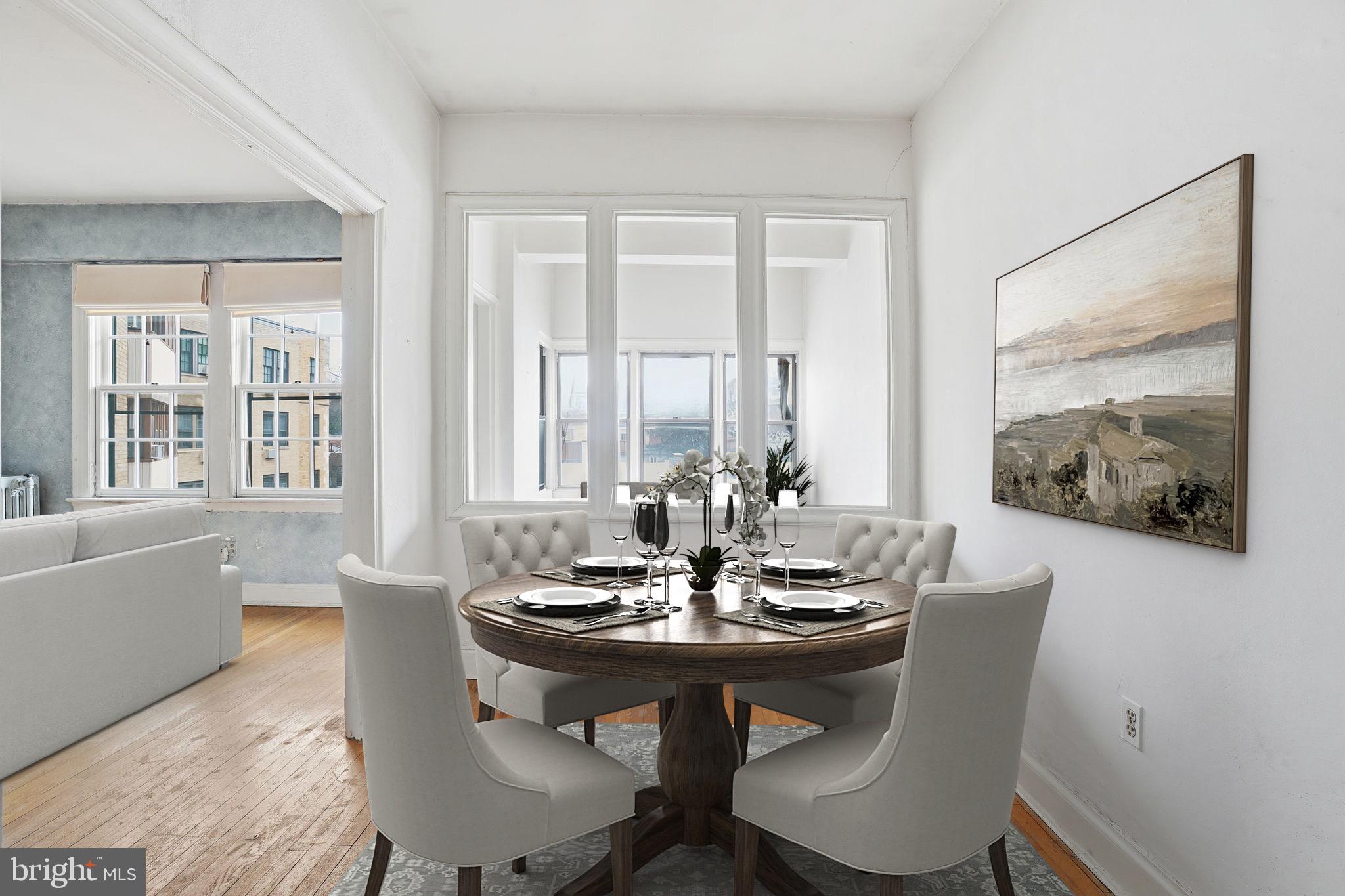 2040 Belmont Road Northwest, Unit 536 Washington, DC 20009 - Photo 4 of 31 a view of a dining room with furniture and window