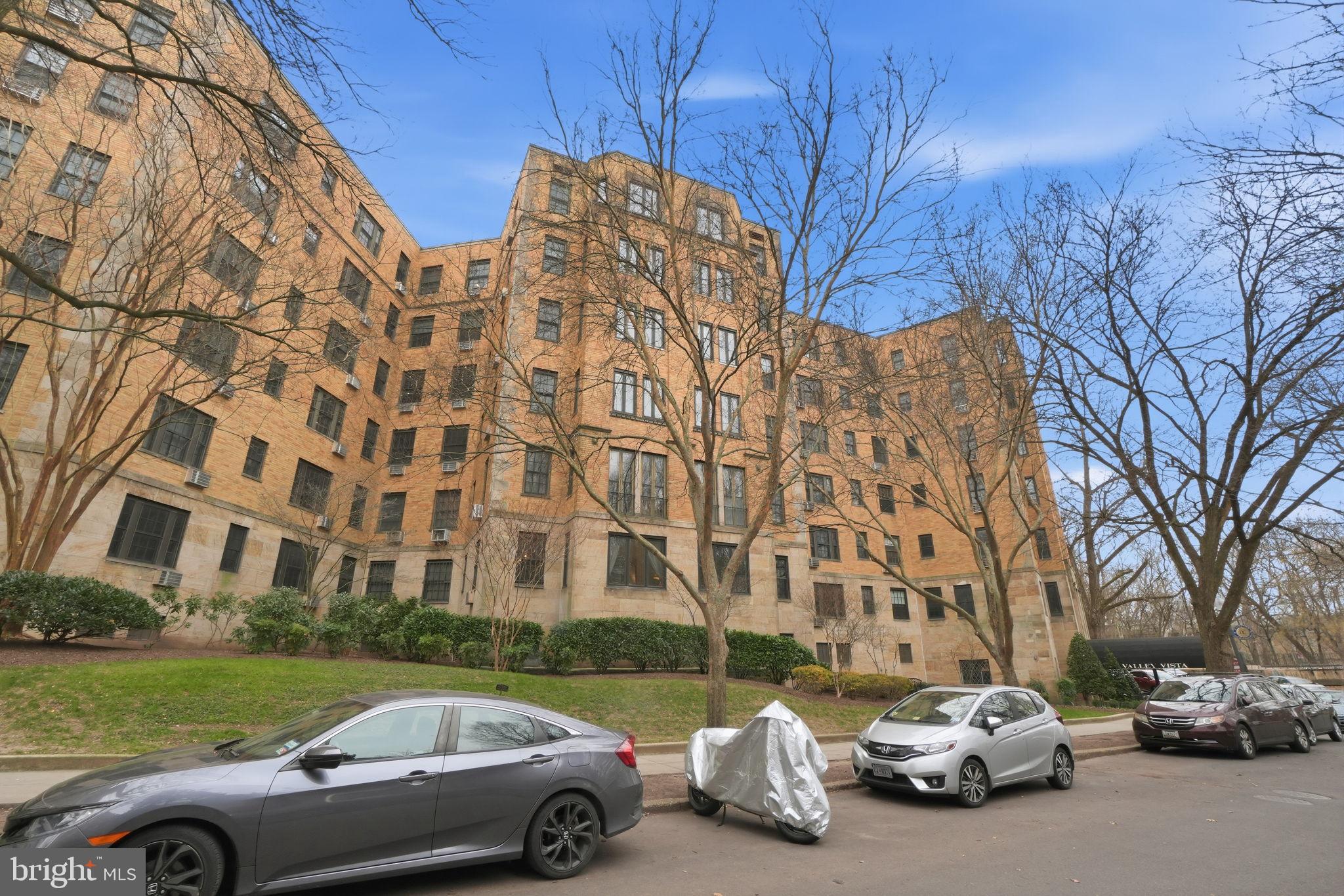 2040 Belmont Road Northwest, Unit 536 Washington, DC 20009 - Photo 7 of 31 a view of a cars parked in front of a house