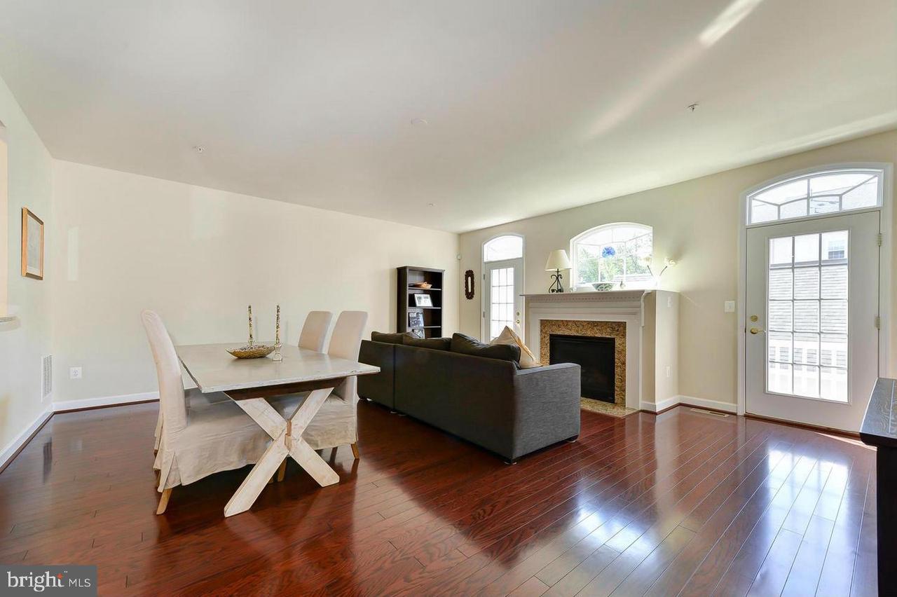 8017 Sport View Road Landover, MD 20785 - Photo 7 of 21 a living room with furniture and a fireplace