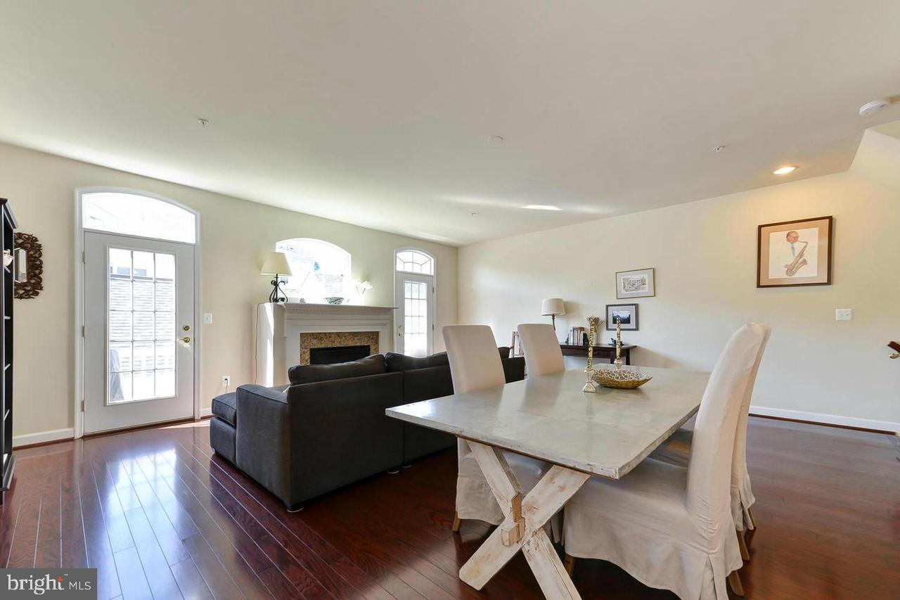 8017 Sport View Road Landover, MD 20785 - Photo 8 of 21 a view of a dining room with furniture window and wooden floor