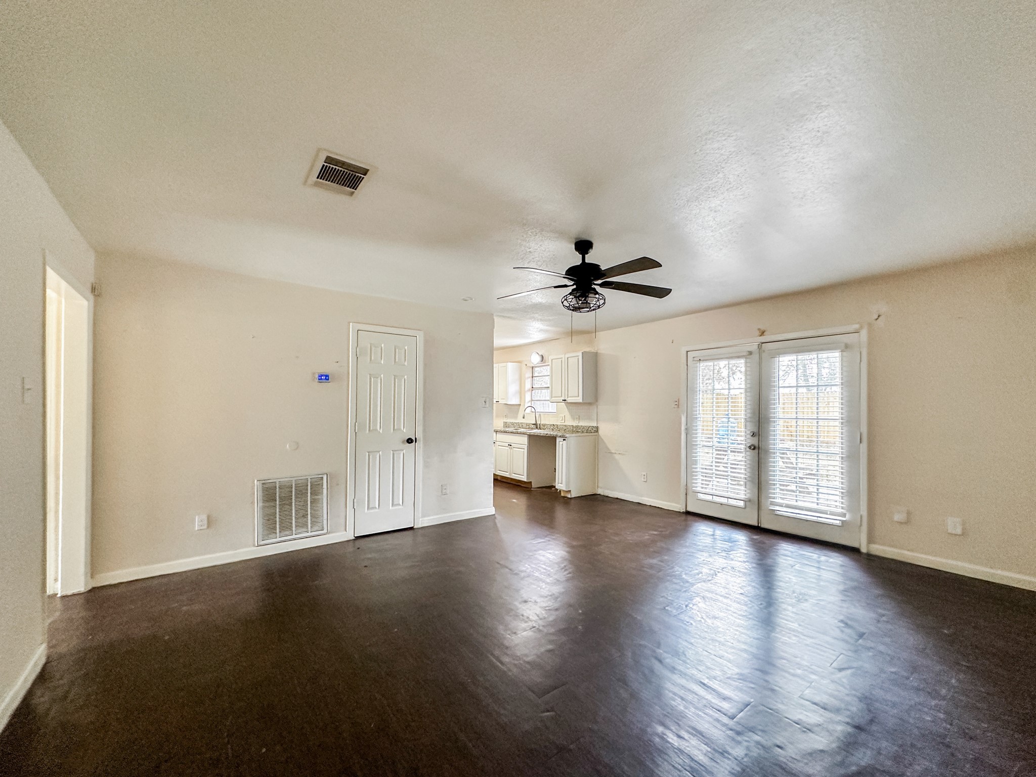 3619 Darling Avenue Pasadena, TX 77503 - Photo 3 of 14 a view of a livingroom with a ceiling fan and window