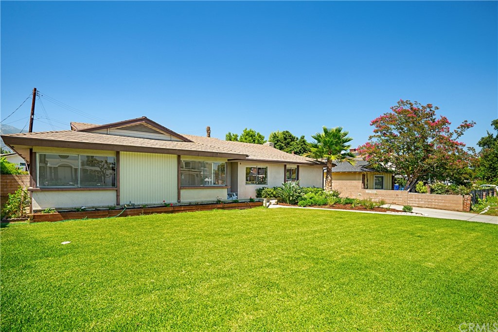 365 Fairview Avenue Arcadia, CA 91007 - Photo 1 of 36 a front view of a house with a garden and yard