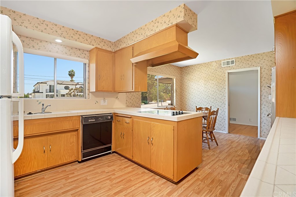 365 Fairview Avenue Arcadia, CA 91007 - Photo 12 of 36 a kitchen with a sink and wooden floor