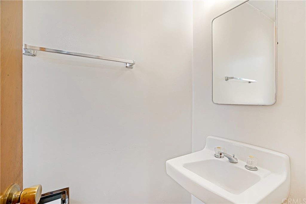 365 Fairview Avenue Arcadia, CA 91007 - Photo 17 of 36 a bathroom with a sink and a mirror