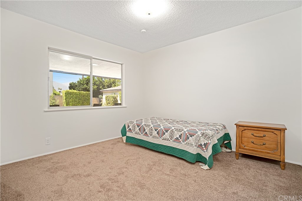 365 Fairview Avenue Arcadia, CA 91007 - Photo 22 of 36 a bedroom with a bed and a window