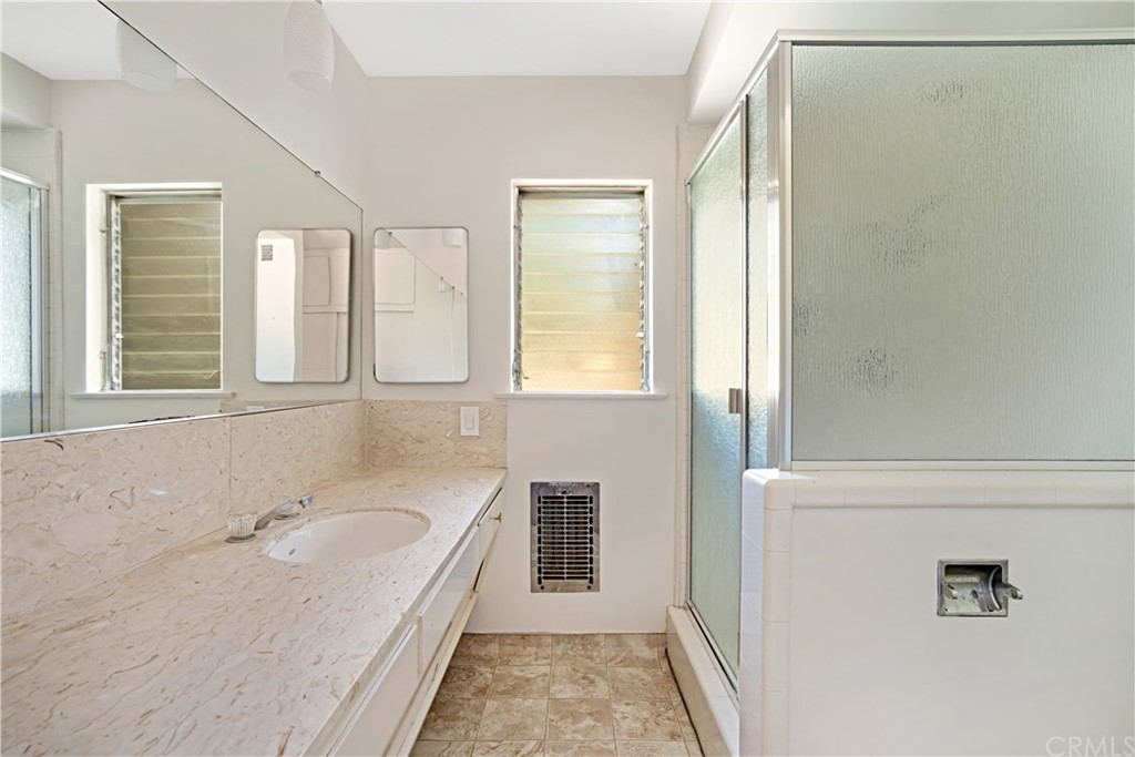 365 Fairview Avenue Arcadia, CA 91007 - Photo 28 of 36 a bathroom with a tub a sink and a window