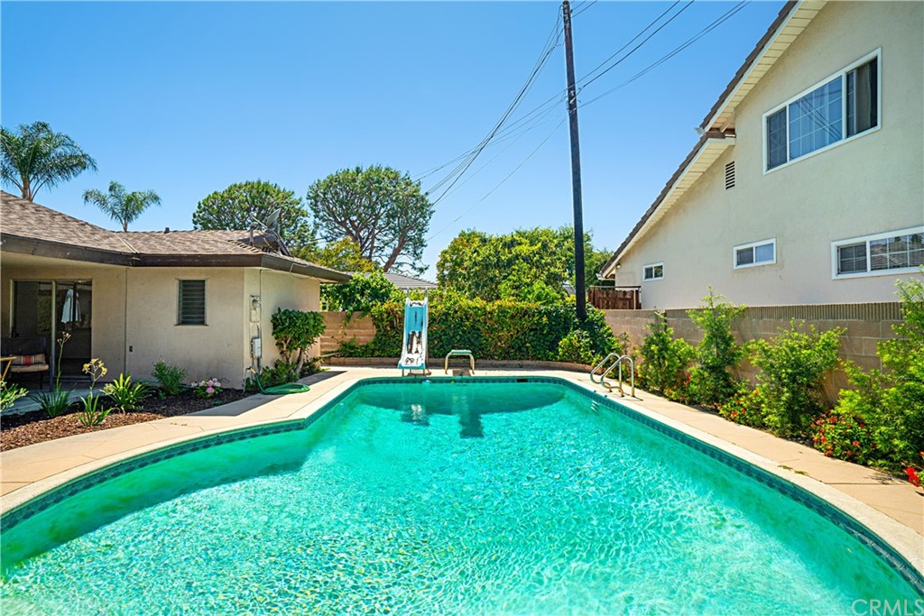 365 Fairview Avenue Arcadia, CA 91007 - Photo 32 of 36 a view of a house with a yard patio and a small yard
