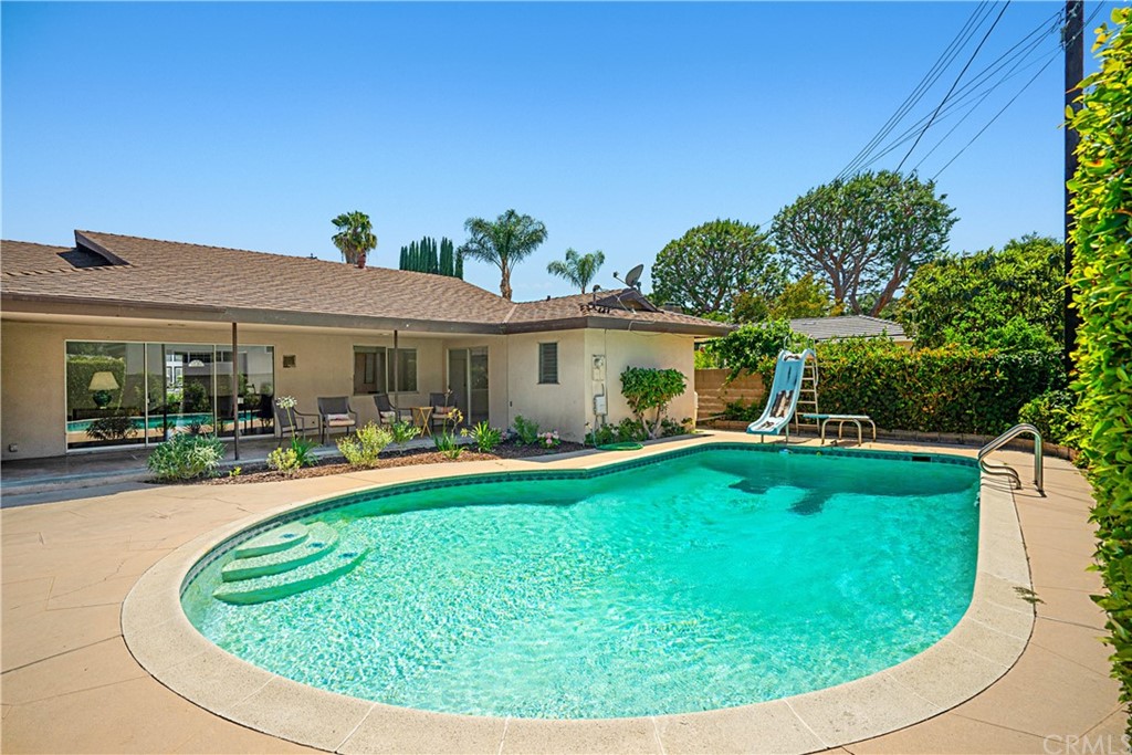 365 Fairview Avenue Arcadia, CA 91007 - Photo 33 of 36 a view of white house with a backyard patio and swimming pool