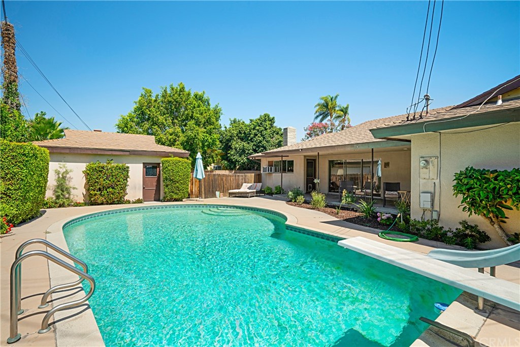 365 Fairview Avenue Arcadia, CA 91007 - Photo 34 of 36 a front view of a house with swimming pool having outdoor seating