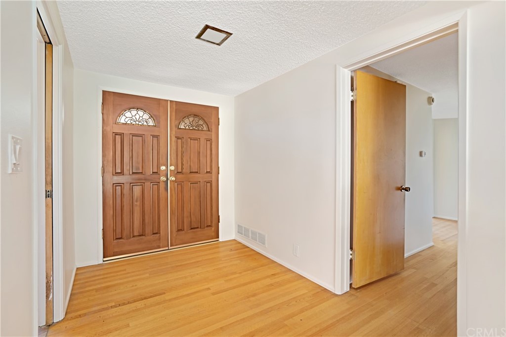 365 Fairview Avenue Arcadia, CA 91007 - Photo 4 of 36 a view of front door with wooden floor