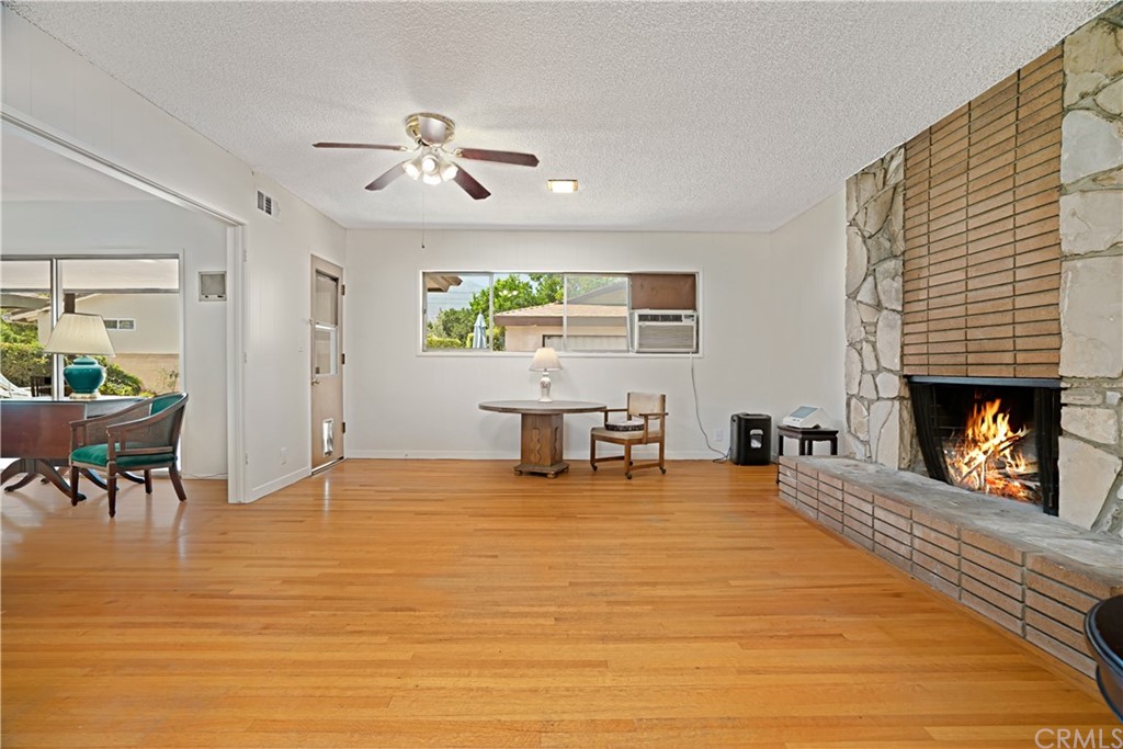 365 Fairview Avenue Arcadia, CA 91007 - Photo 10 of 36 a living room with furniture and a fireplace
