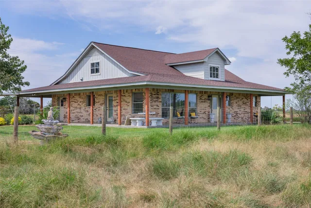 a kitchen with a sink appliances and cabinets