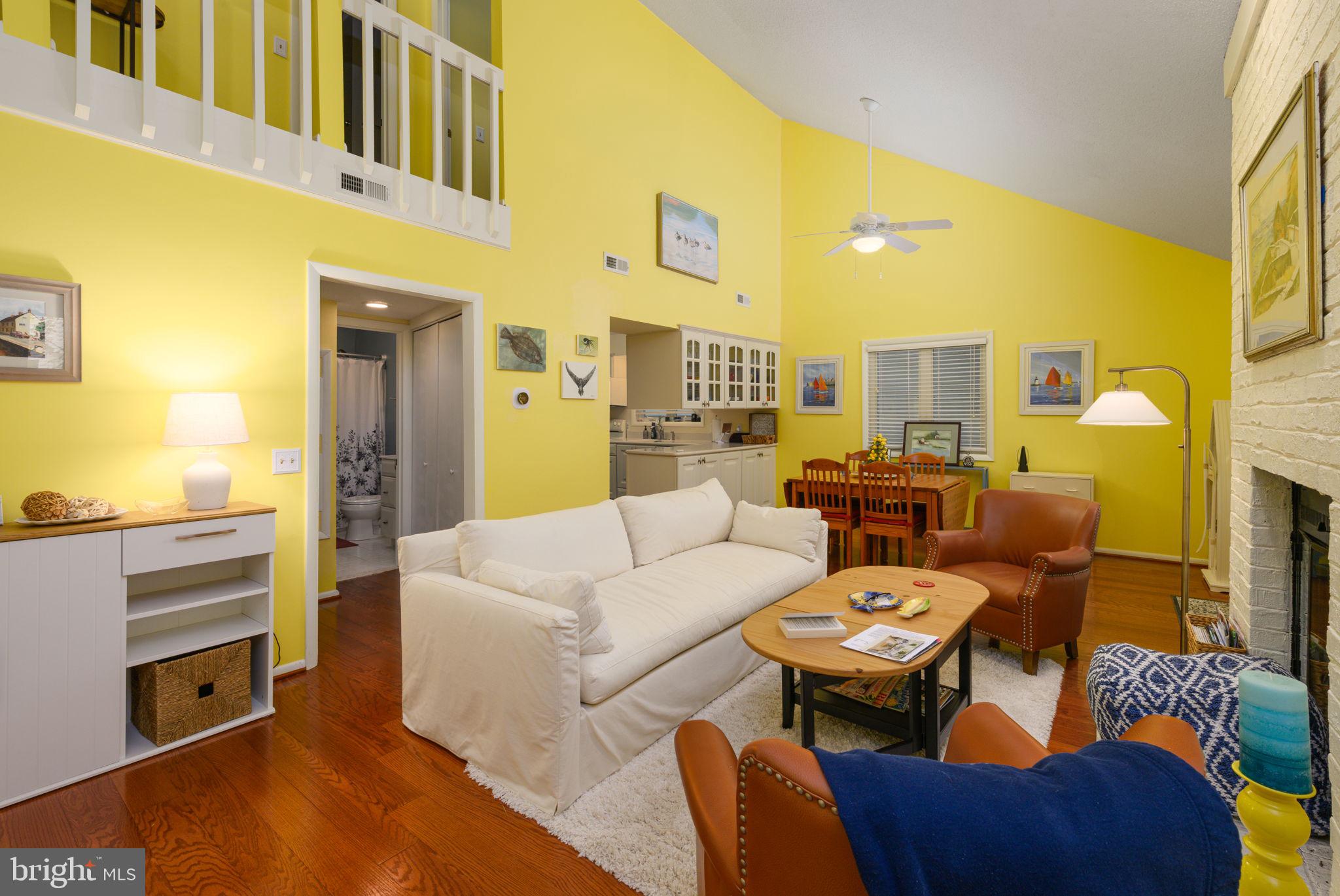 10 Gloucester Road Ocean Pines, MD 21811 - Photo 3 of 37 a living room with furniture and a kitchen view